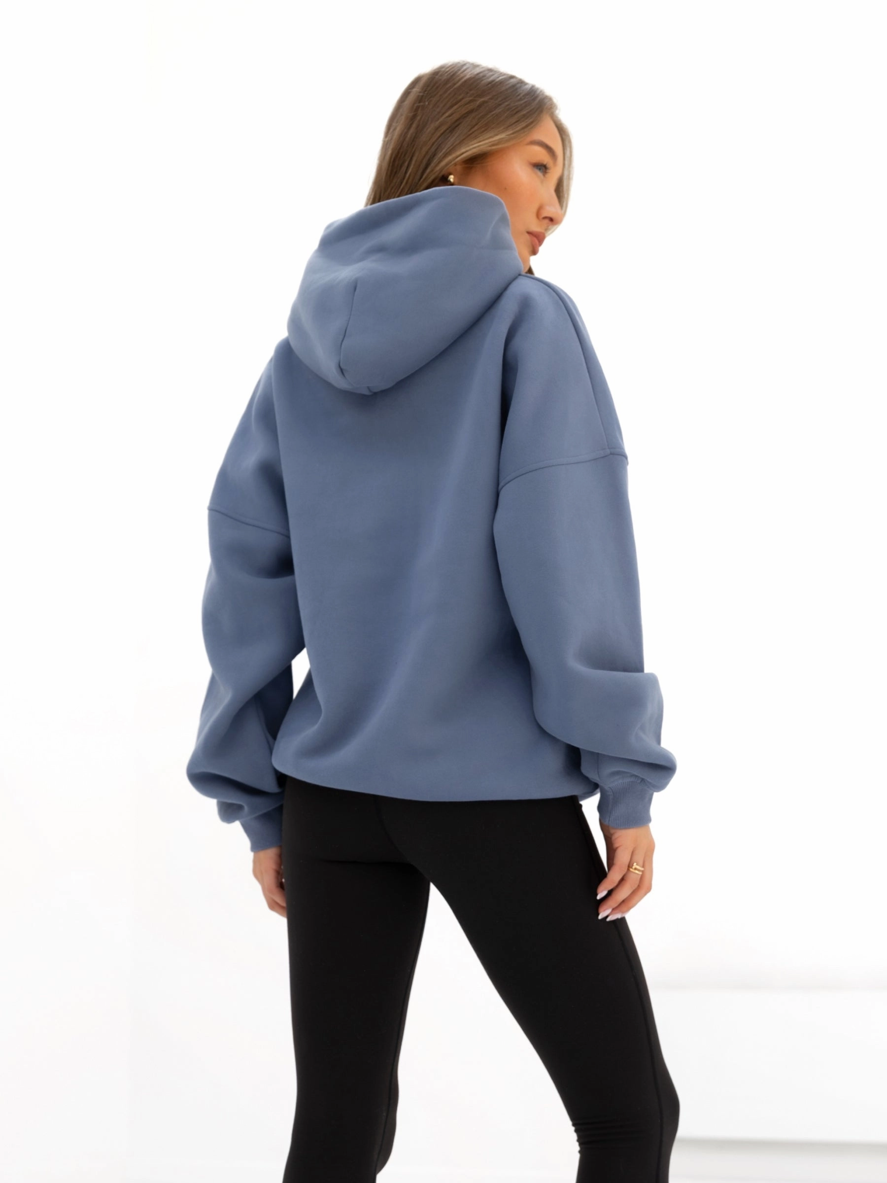 Brooklyn 610 Oversized Hoodie - Mid Blue Striped Design Lounging At Home