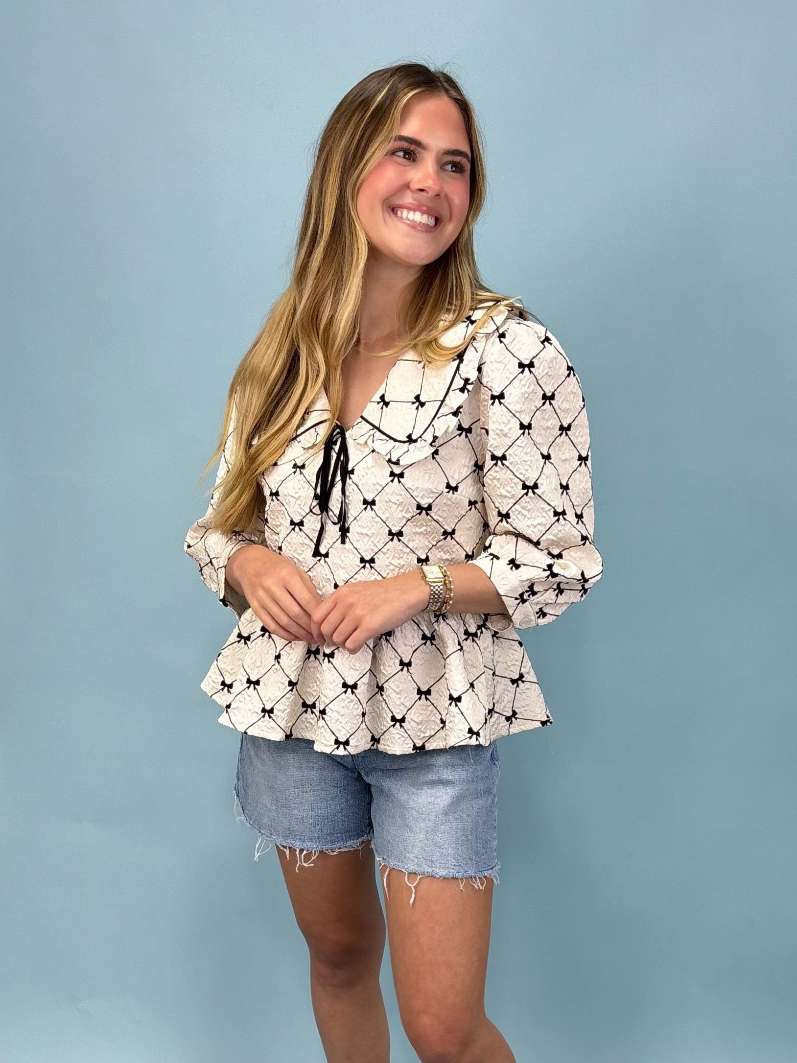 Flirty Chic Bow Peplum Top Biodegradable material FadeResistant Finish