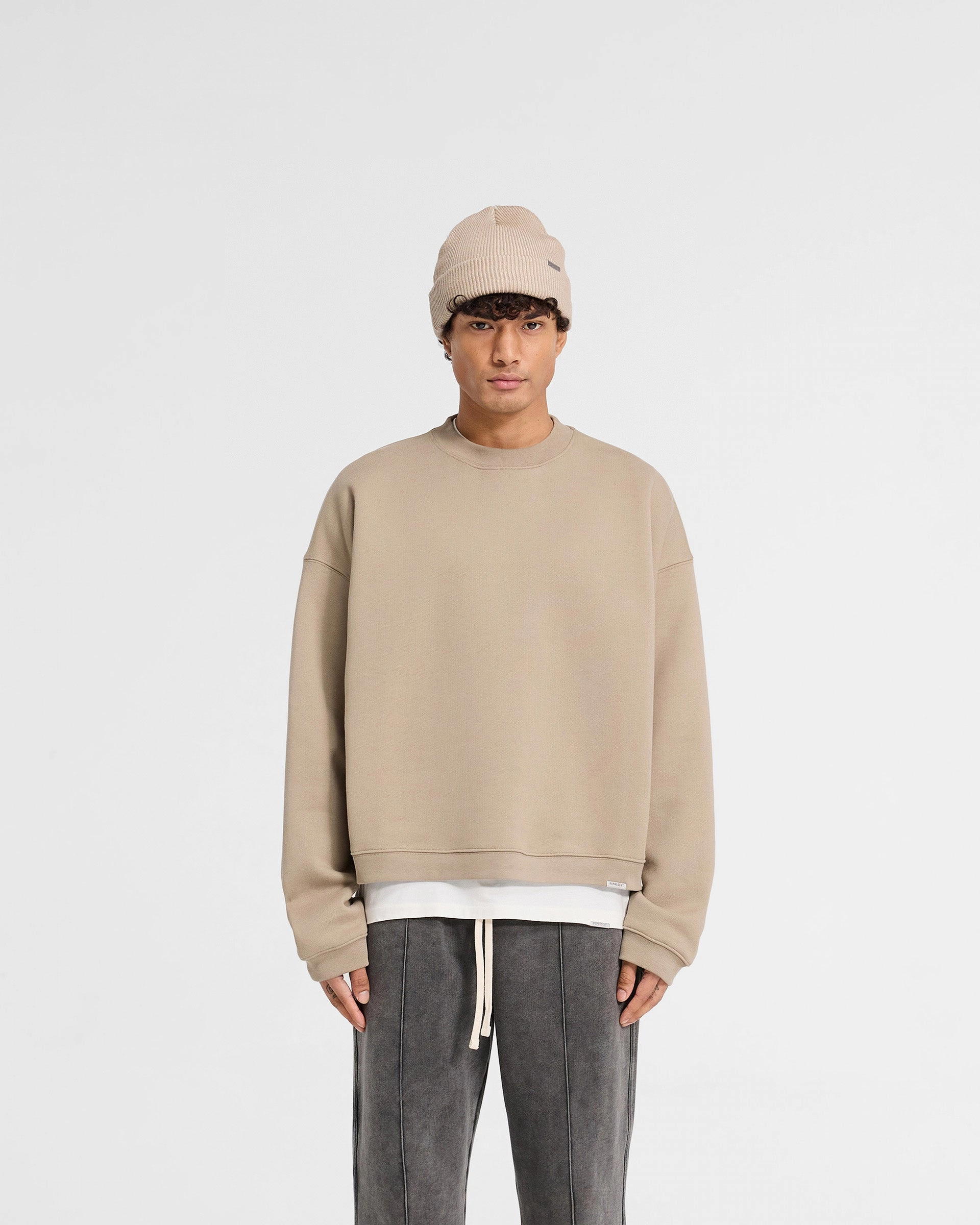 Tailored Silhouette Stain Release Coating Initial Boxy Sweater - Dune